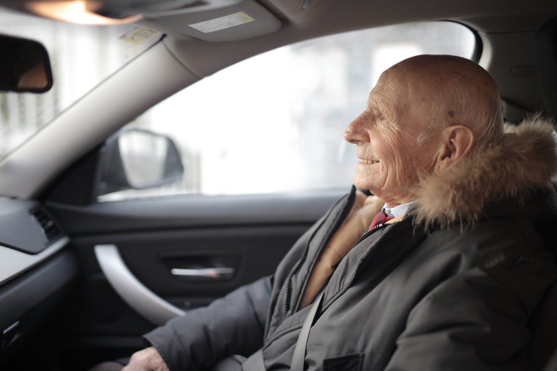 old man taking a driving evaluation for seniors